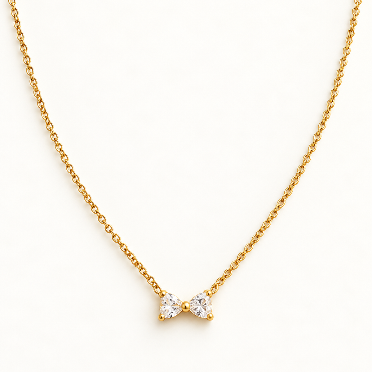 Gouden ketting met sprankelende strikhanger – The Sparkle Bow | Enjoia
