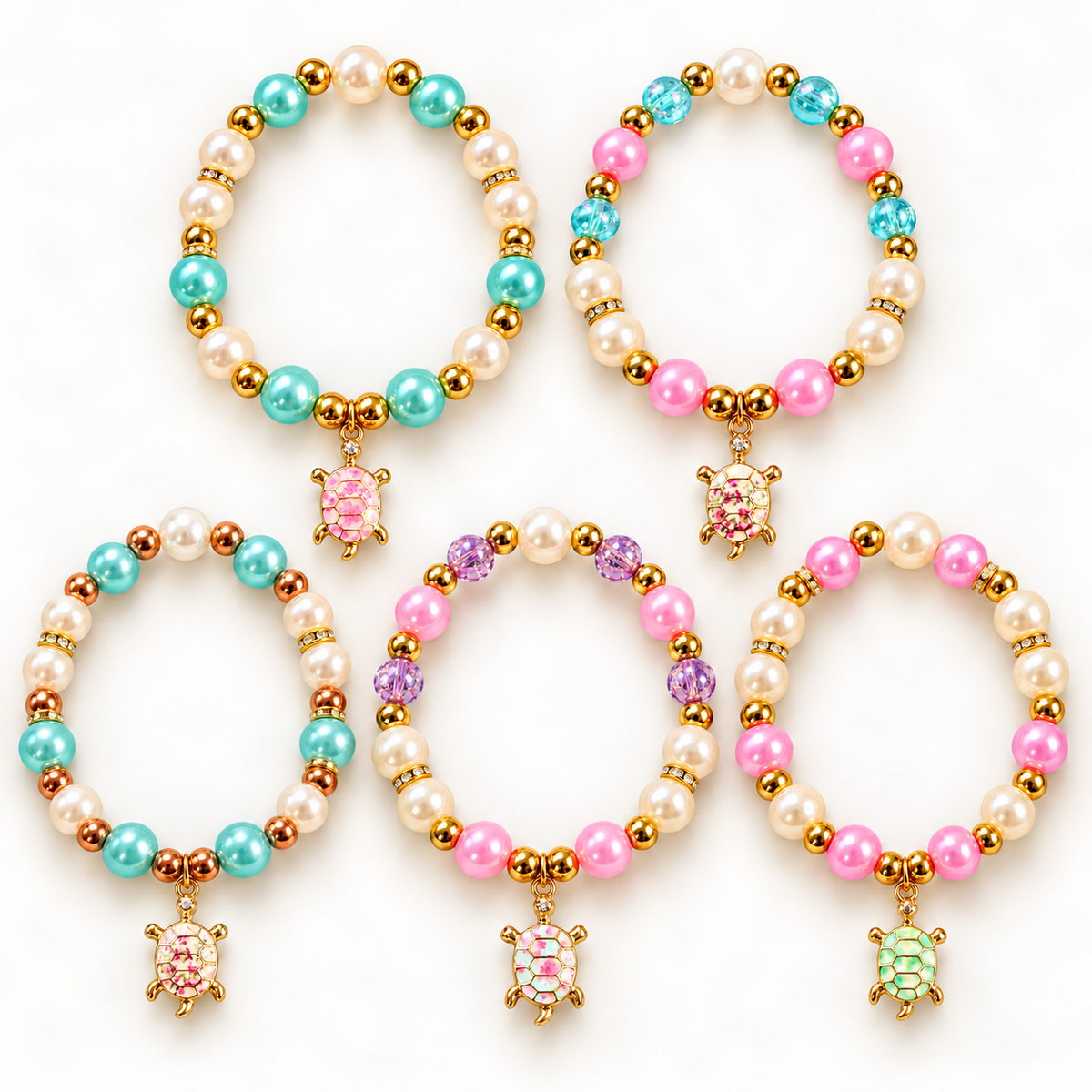 Pastelkleurige armbanden met schildpadbedels | Enjoia