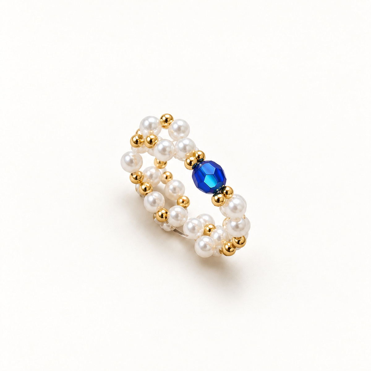 Royal Blue parelkralenring met blauwe accentkraal