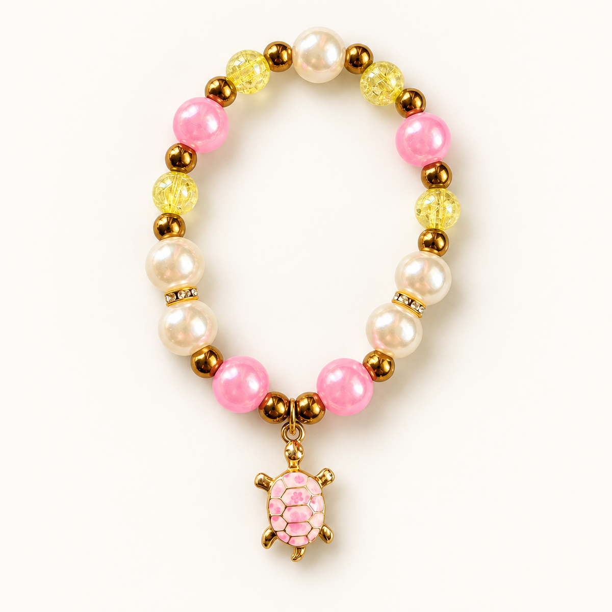 Tiny Turtles Sunny Shell armband 18 cm – Roze en geel-transparante kralen met roze schildpadbedel