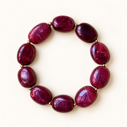 Bordeauxrode kralenarmband met goudkleurige accenten | Enjoia