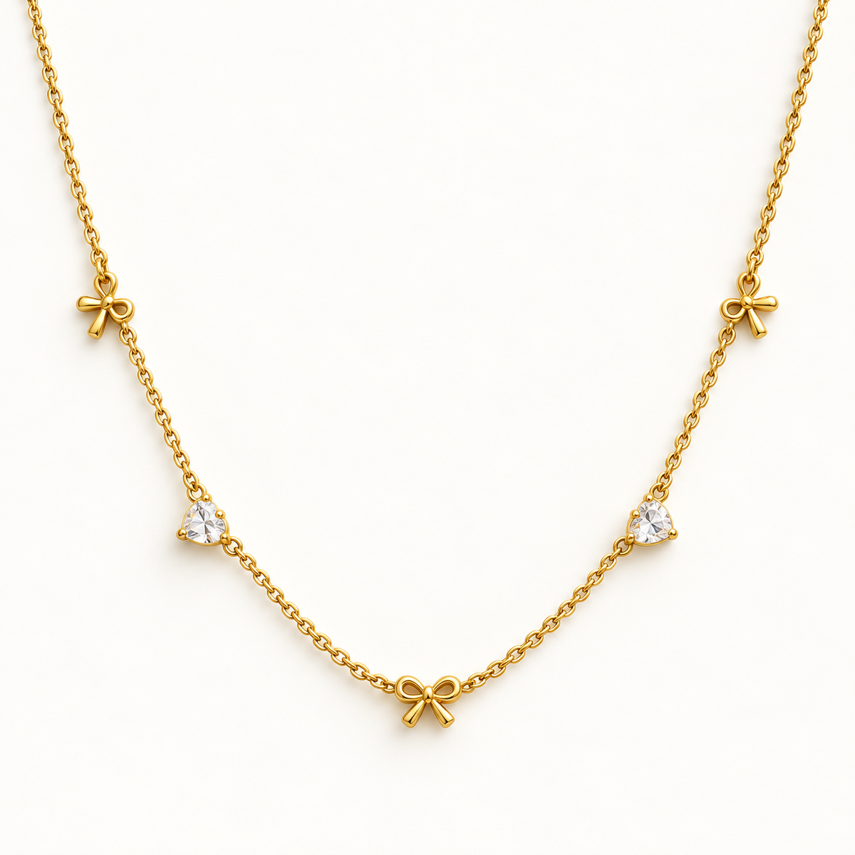Gouden ketting met strikjes en hartjes – The Sweetheart Bow | Enjoia