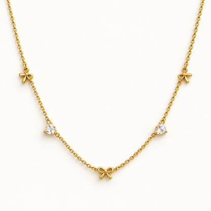 Gouden ketting met strikjes en hartjes – The Sweetheart Bow | Enjoia