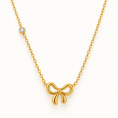 Goudkleurige strikketting met fonkelende hanger – The Mini Bow | Enjoia