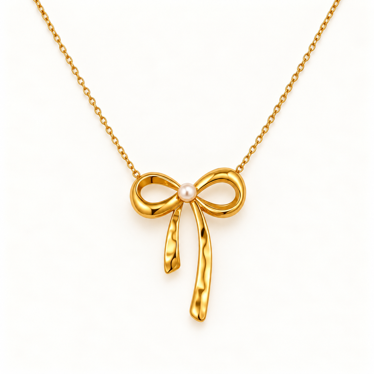 Gouden strikketting met parel – The Pearl Bow | Enjoia