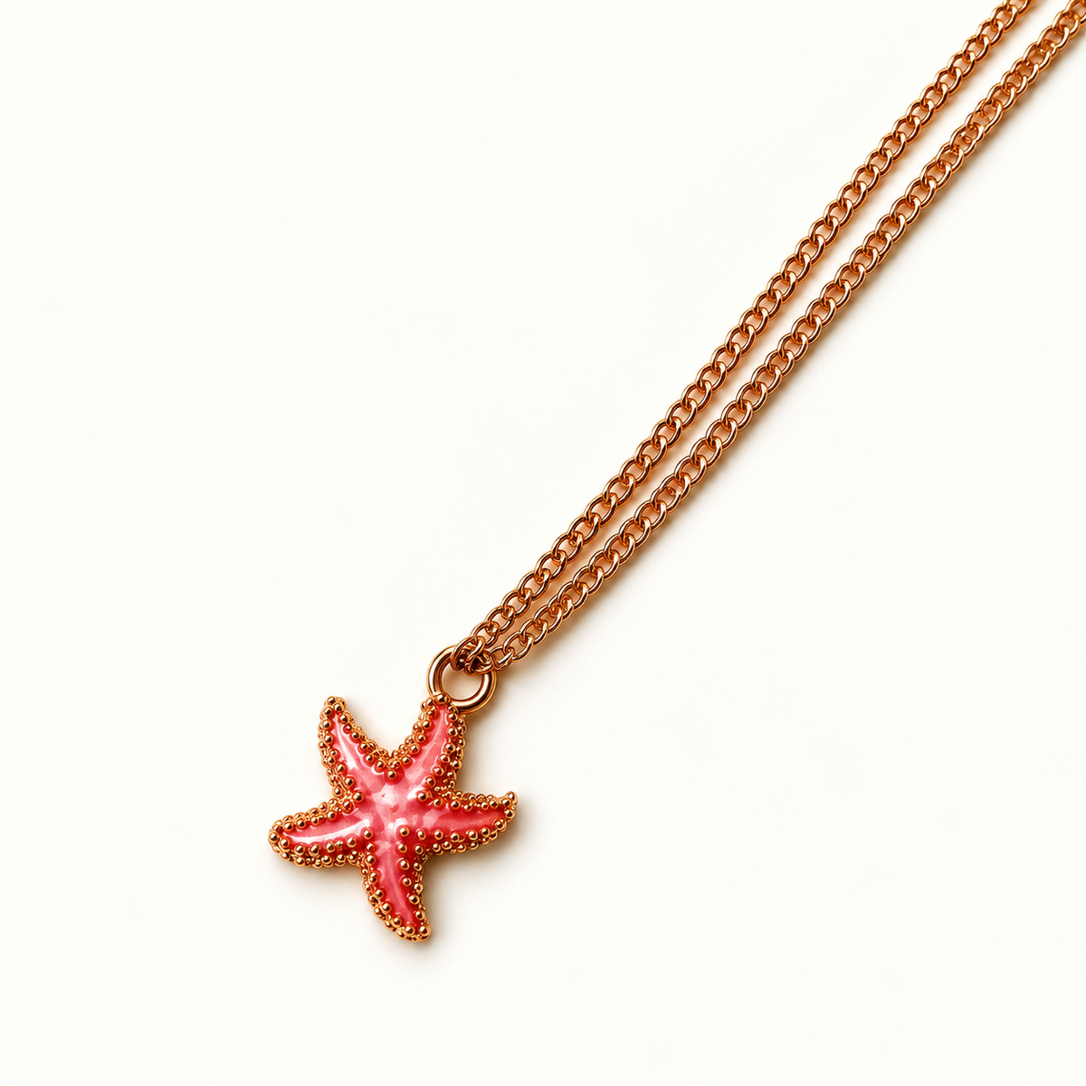 Koraalkleurige zeesterhanger aan gouden ketting – Start of the Sea | Enjoia