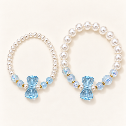 Parelarmbanden met blauwe strikbedels – Blue Belle | Enjoia