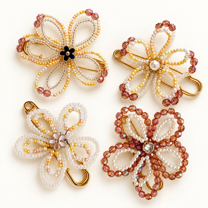 Vier elegante bloemenbroches met parels | Enjoia