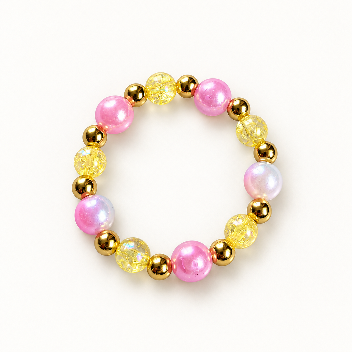 Mini Candy Sunny Candy – kinderarmband met roze en gele kralen en goudkleurige accenten
