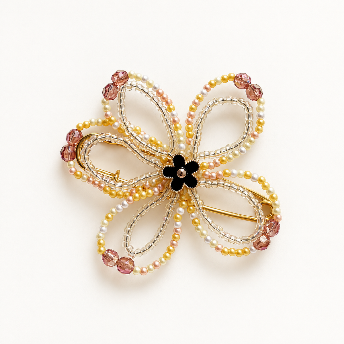 Rouge Bloom Golden Black bloemenbroche met zwarte bloemenkern en champagneparels