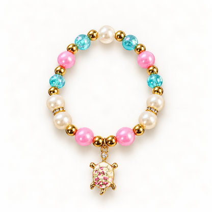 Tiny Turtles Candy Lagoon armband 18 cm – Roze en turquoise kralen met bloemige schildpadbedel