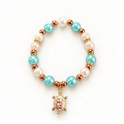 Tiny Turtles Rose Lagoon armband 18 cm – Turquoise en parelkleurige kralen met roségoudkleurige accenten en schildpadbedel