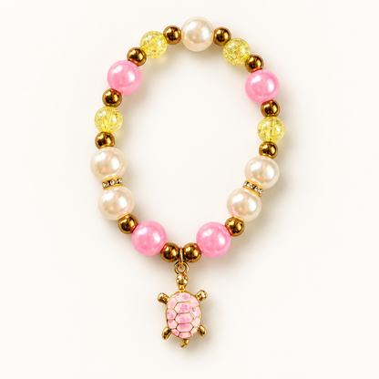 Tiny Turtles Sunny Shell armband 18 cm – Roze en geel-transparante kralen met roze schildpadbedel